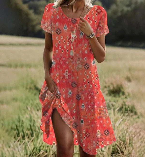 Sophia – orange midi dress with short sleeves and a round neckline