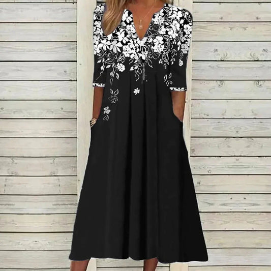 Elizabeth – modern midi dress with floral print and half-length sleeves