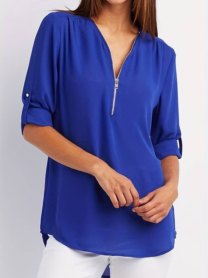 Hazel – casual, ruffled blouse with roll-up sleeves and half zip