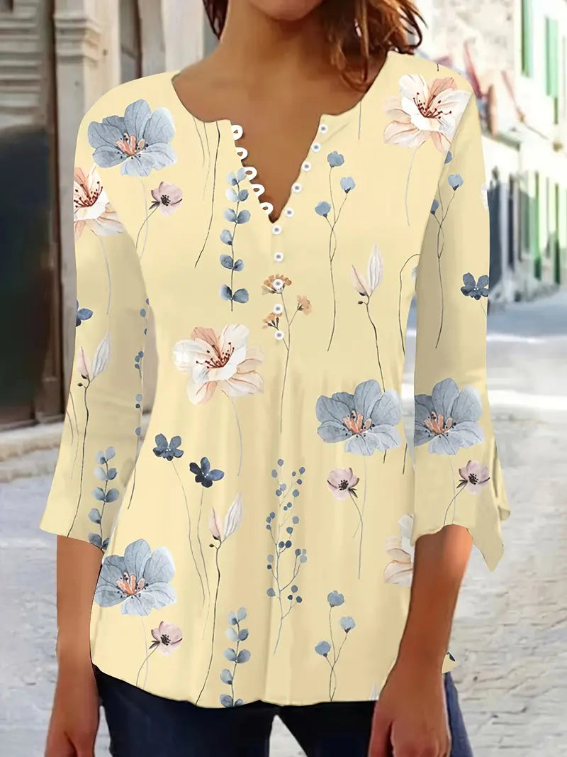 Fiorella – floral print top with buttons and flared sleeves