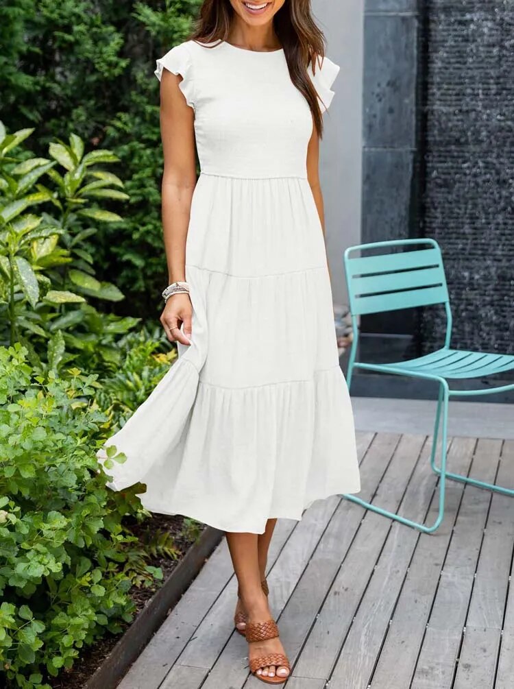 Elegant summer dress: ruffle details, pockets