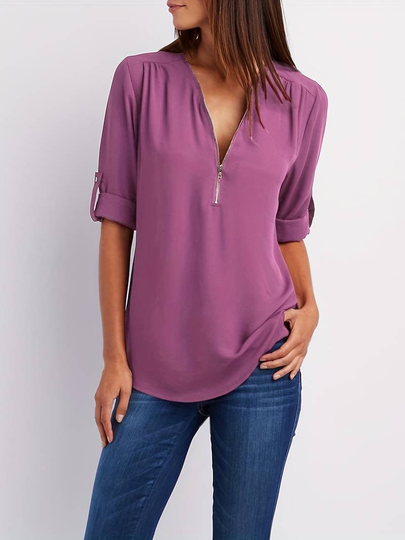 Hazel – casual, ruffled blouse with roll-up sleeves and half zip