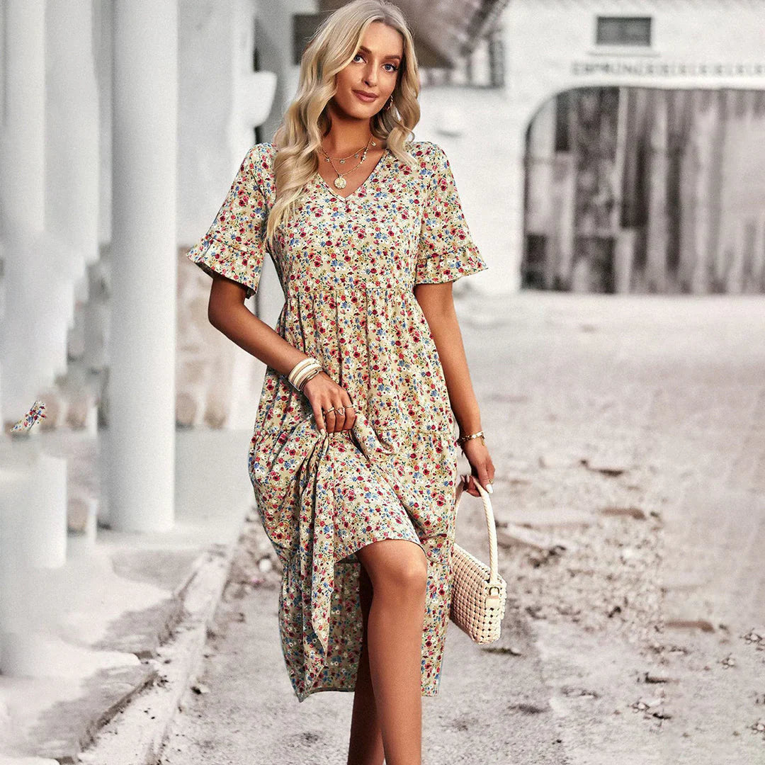 Lena – playful summer dress in apricot with a floral print