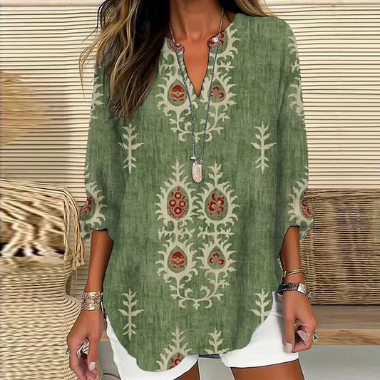 Ava – unique green blouse with n-neck