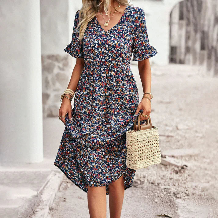 Lena – playful summer dress in apricot with a floral print