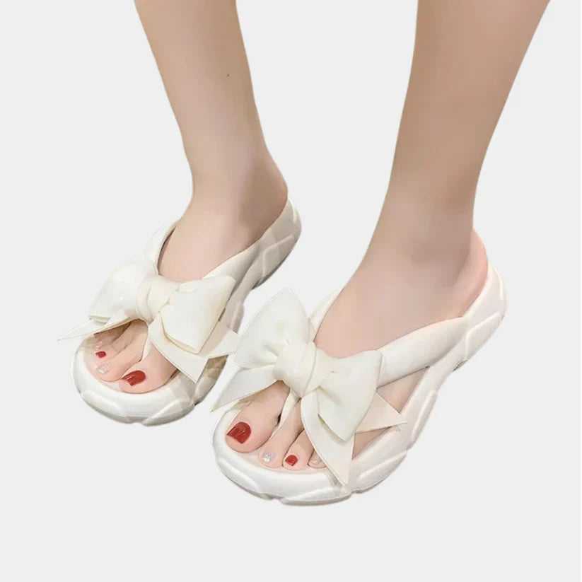 Damonie | Elegant women's slippers with bow detail