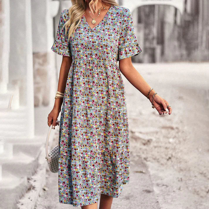 Lena – playful summer dress in apricot with a floral print