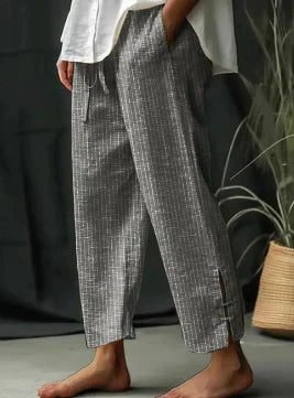 Classic striped slit trousers with pockets and lacing