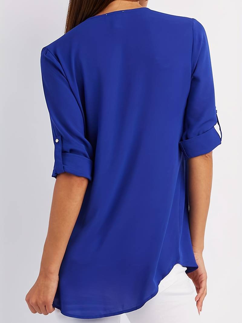 Hazel – casual, ruffled blouse with roll-up sleeves and half zip