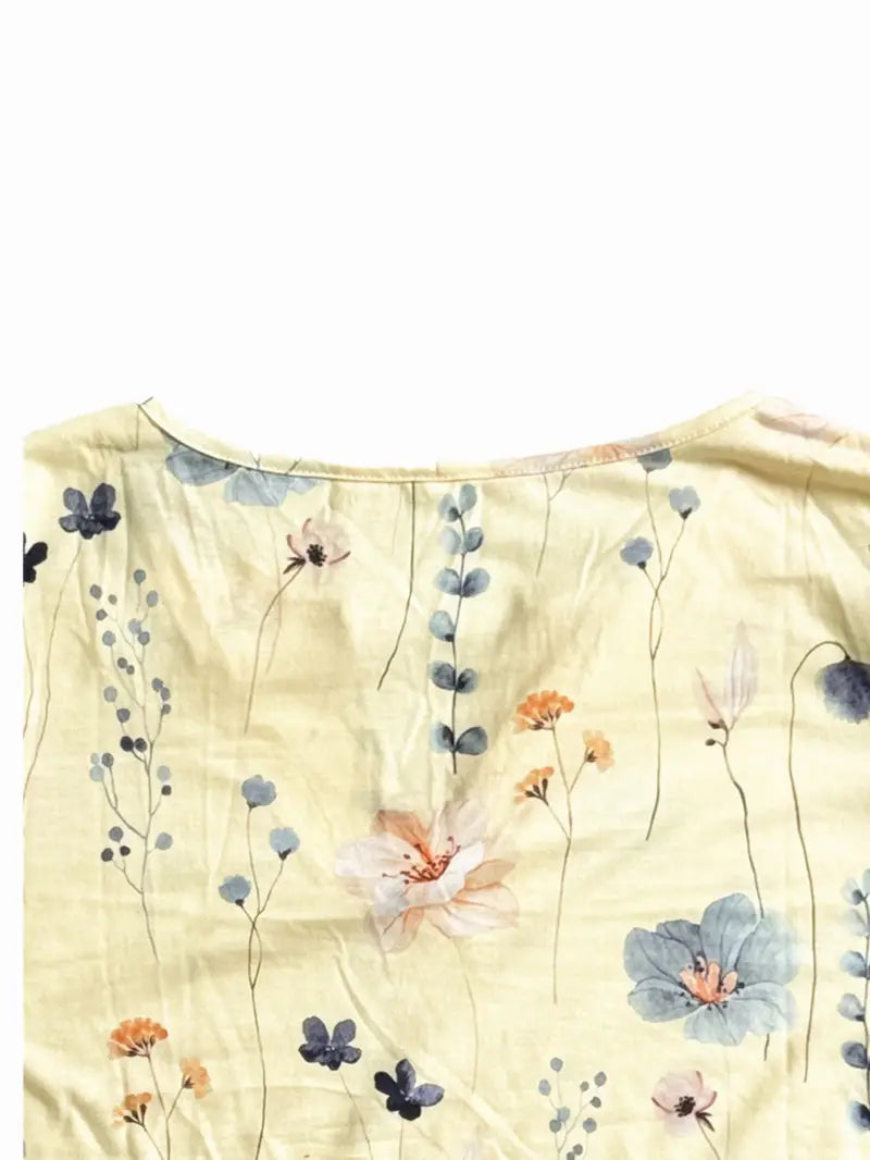 Fiorella – floral print top with buttons and flared sleeves