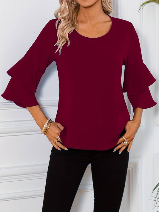 Abigail – blouse with a round neckline and flared sleeves